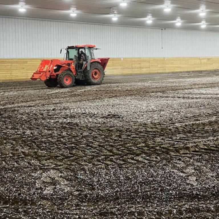 how to apply magnesium chloride flakes to riding arenas